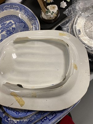 Lot 300 - A set of eleven ‘Willow’ pattern graduated meat and serving plates
