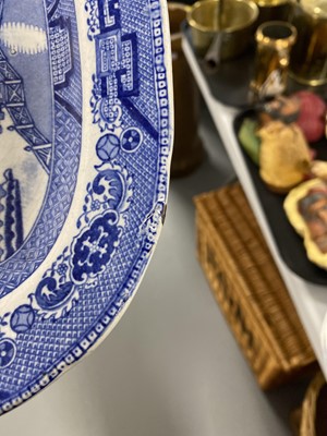 Lot 300 - A set of eleven ‘Willow’ pattern graduated meat and serving plates
