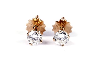 Lot 588 - A pair of diamond stud earrings