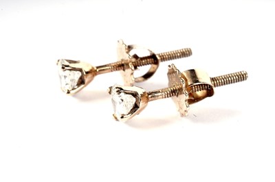 Lot 588 - A pair of diamond stud earrings