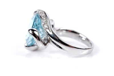 Lot 1138 - A topaz and diamond cocktail ring