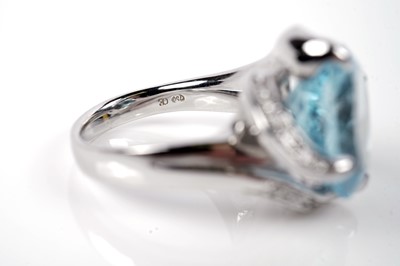 Lot 1138 - A topaz and diamond cocktail ring