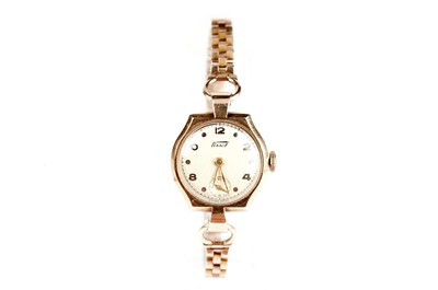 Lot 415 - Two gold cocktail watches, by Tissot and Rotary