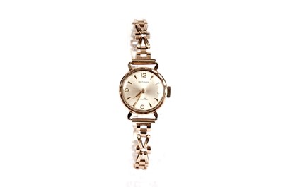 Lot 415 - Two gold cocktail watches, by Tissot and Rotary