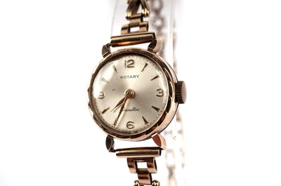 Lot 415 - Two gold cocktail watches, by Tissot and Rotary