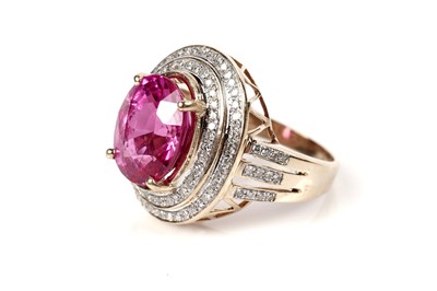 Lot 199 - A synthetic pink sapphire and diamond cluster ring