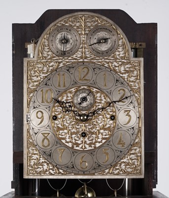 Lot 668 - A large and impressive carved walnut Elliott quarter chiming longcase clock