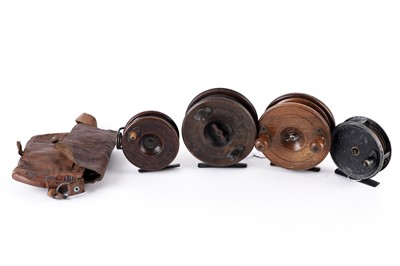 Lot 512 - Four vintage fishing reels