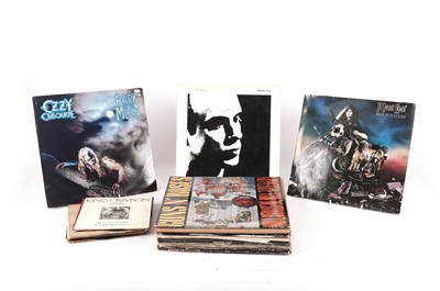 Lot 105 - A collection of mixed rock LPs and singles