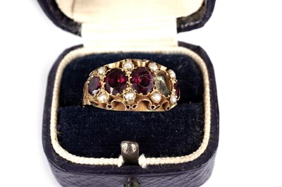 Lot 505 - A Victorian red stone and seed pearl ring; two other rings; a pin; and two dress studs