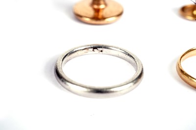 Lot 505 - A Victorian red stone and seed pearl ring; two other rings; a pin; and two dress studs