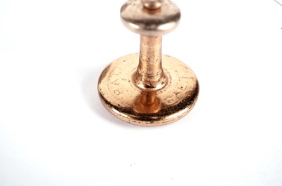 Lot 505 - A Victorian red stone and seed pearl ring; two other rings; a pin; and two dress studs