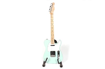 Lot 37 - A Squier Telecaster electric guitar