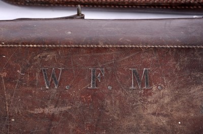 Lot 527 - Two antique leather leg of mutton gun cases