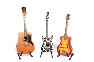 Lot 39 - Two acoustic guitars and an electric