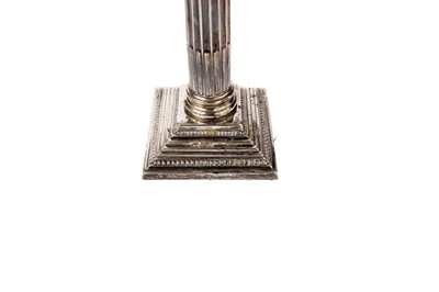 Lot 1326 - A set of four Elizabeth II dwarf candlesticks
