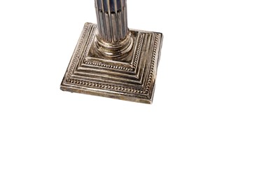Lot 1326 - A set of four Elizabeth II dwarf candlesticks