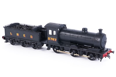 Lot 6 - A metal kit-built 0-gauge 0-6-0 locomotive and six-wheel tender