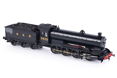 Lot 10 - A metal kit-built 0-gauge 0-8-0 locomotive and six-wheel tender