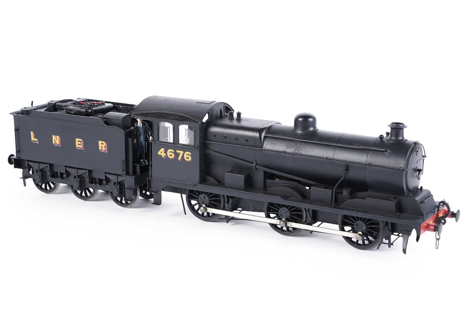 Lot 12 - A metal kit-built 0-gauge 0-6-0 locomotive and six-wheel tender