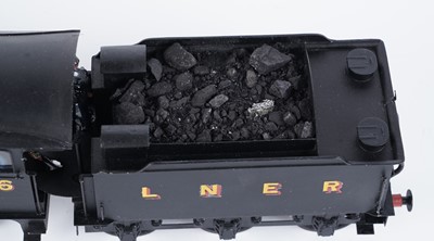 Lot 12 - A metal kit-built 0-gauge 0-6-0 locomotive and six-wheel tender