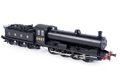 Lot 14 - A metal kit-built 0-gauge 0-8-0 locomotive and six-wheel tender
