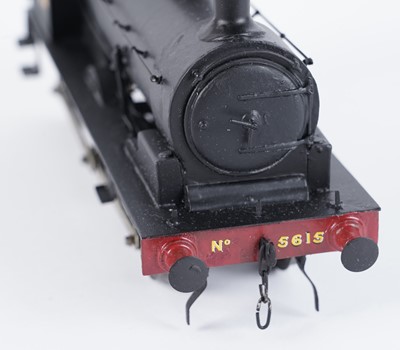 Lot 16 - A metal kit-built 0-gauge 0-4-2 locomotive and six-wheel tender