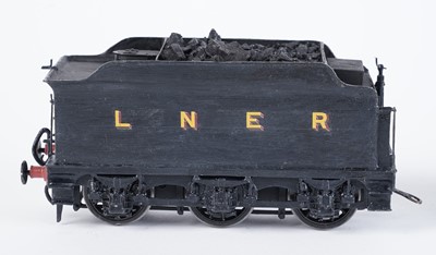Lot 20 - A metal kit-built 0-gauge 4-4-0 locomotive and six-wheel tender