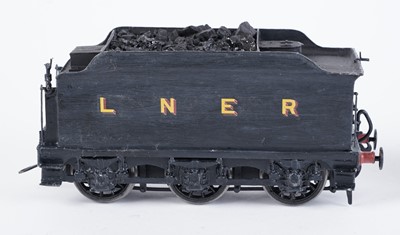 Lot 20 - A metal kit-built 0-gauge 4-4-0 locomotive and six-wheel tender