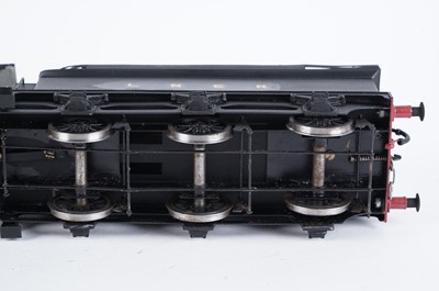 Lot 21 - A metal kit-built 0-gauge 0-6-0 locomotive and six-wheel tender