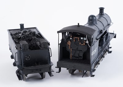 Lot 26 - A plastic kit-built 0-gauge 2-8-0 locomotive and six-wheel tender