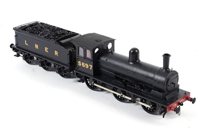 Lot 30 - A metal kit-built 0-gauge 0-4-2 locomotive and six-wheel tender