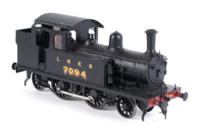 Lot 33 - A metal kit-built 0-gauge 2-4-2 locomotive