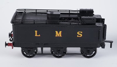 Lot 52 - A metal kit-built 0-gauge 4-4-0 locomotive and six-wheel tender