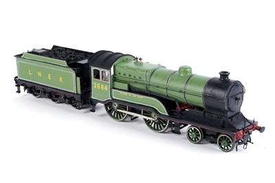 Lot 56 - A metal kit-built 0-gauge 4-4-0 locomotive and six-wheel tender
