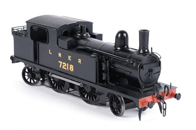 Lot 63 - A metal kit-built 0-gauge 2-4-2 locomotive