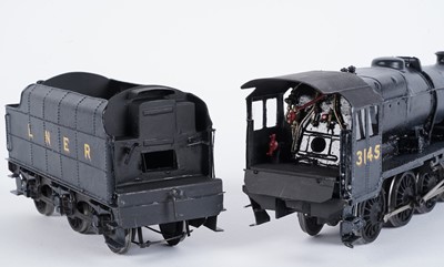 Lot 72 - A metal kit-built 0-gauge 2-8-0 locomotive and six-wheel tender