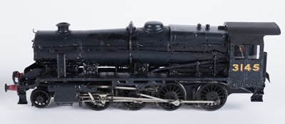Lot 72 - A metal kit-built 0-gauge 2-8-0 locomotive and six-wheel tender