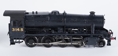 Lot 72 - A metal kit-built 0-gauge 2-8-0 locomotive and six-wheel tender