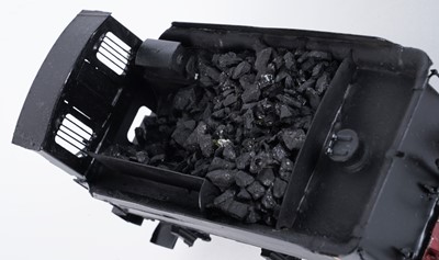 Lot 73 - A metal kit-built 0-gauge 0-6-0 locomotive and six-wheel tender