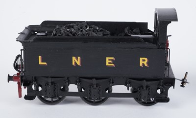 Lot 73 - A metal kit-built 0-gauge 0-6-0 locomotive and six-wheel tender