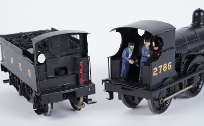 Lot 73 - A metal kit-built 0-gauge 0-6-0 locomotive and six-wheel tender