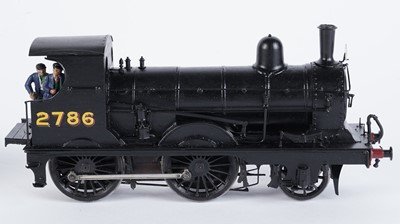 Lot 73 - A metal kit-built 0-gauge 0-6-0 locomotive and six-wheel tender