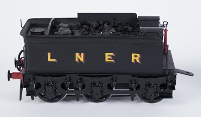 Lot 74 - A metal kit-built 0-gauge 0-6-0 locomotive and six-wheel tender