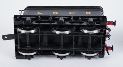 Lot 74 - A metal kit-built 0-gauge 0-6-0 locomotive and six-wheel tender