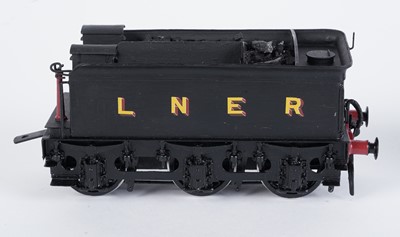 Lot 74 - A metal kit-built 0-gauge 0-6-0 locomotive and six-wheel tender