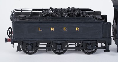 Lot 89 - A metal kit-built 0-gauge 4-4-0 locomotive and six-wheel tender