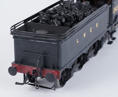 Lot 89 - A metal kit-built 0-gauge 4-4-0 locomotive and six-wheel tender
