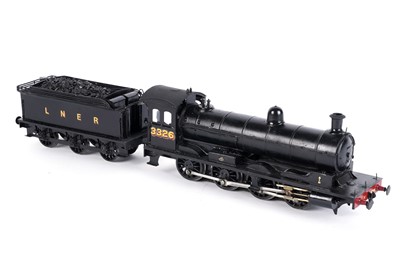 Lot 90 - A metal kit-built 0-gauge 0-8-0 locomotive and six-wheel tender