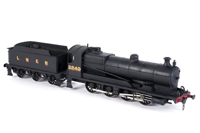 Lot 91 - A metal kit-built 0-gauge 0-8-0 locomotive and six-wheel tender